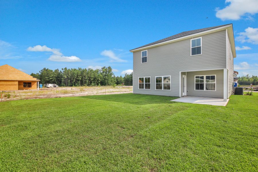 Representative exterior photo of a completed home built from the Seabrook by Ernest Homes in Wexford, Richmond Hill, GA (Image 30).