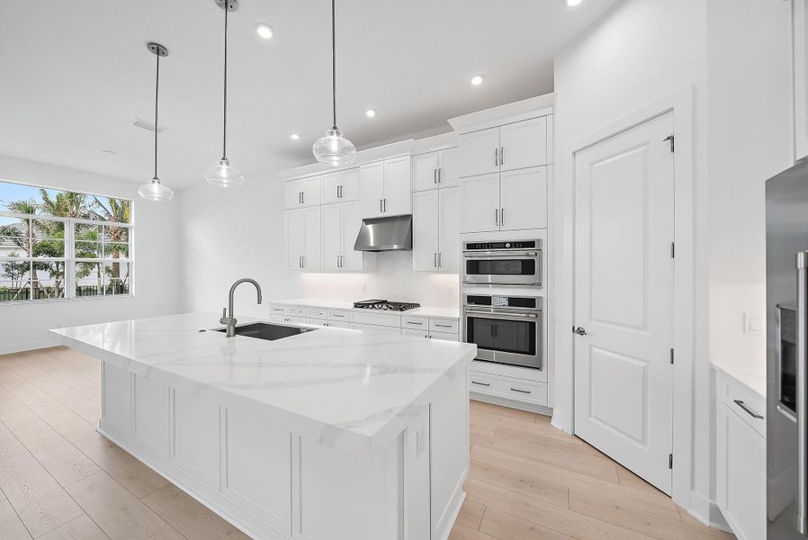 Furnished interior view inside a new home in L'Ambiance at Avenir, Palm Beach Gardens (Image 12).