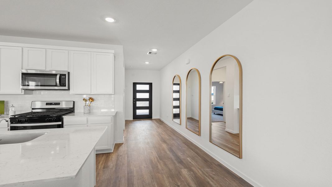 Representative furnished interior of a home built from the Rosemont by D.R. Horton in Sunterra Lakes, Brookshire (Image 8).