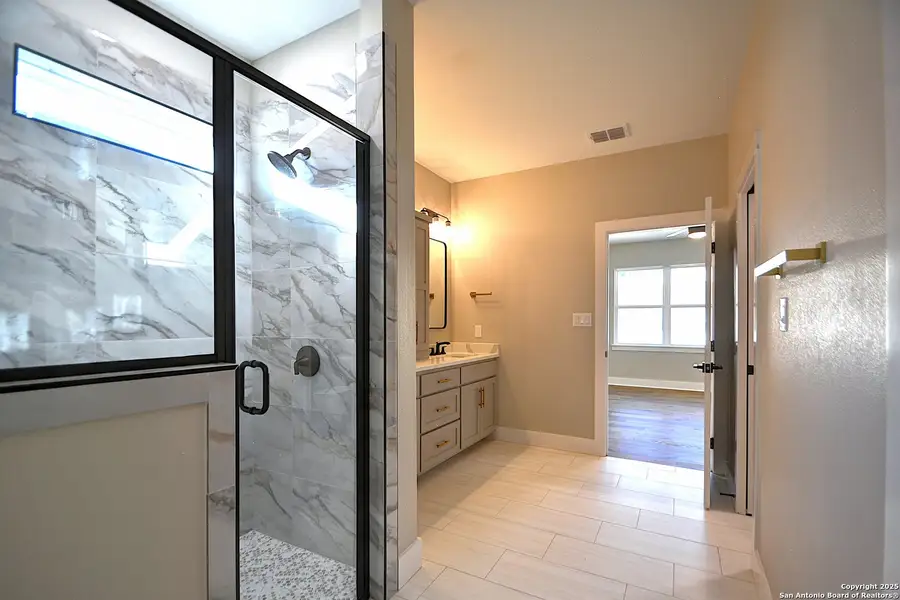 Furnished interior view inside a new home in , Kerrville (Image 11).