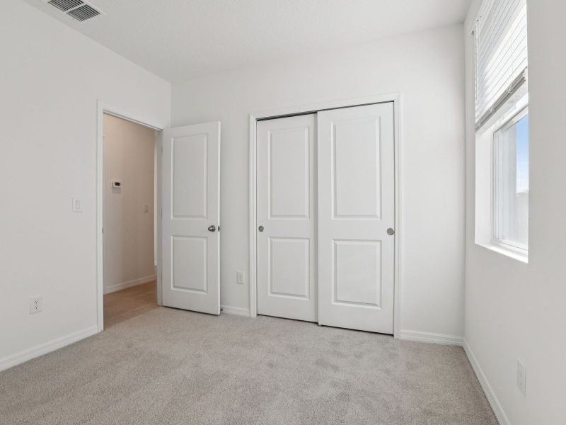 Spacious, unfurnished interior of a new home in Salt Meadows - Premier Series, Parrish (Image 12). Spacious, unfurnished interior of a new home in Salt Meadows - Premier Series, Parrish (Image 12).