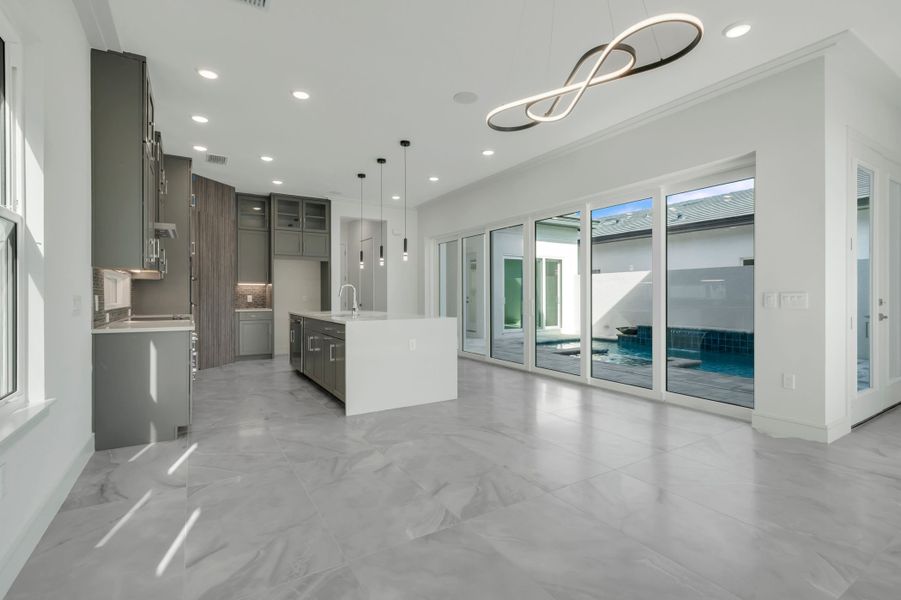 Representative furnished interior of a home built from the Courtyard 50 by ABD Development in Hampton Green at Providence, Davenport (Image 6).