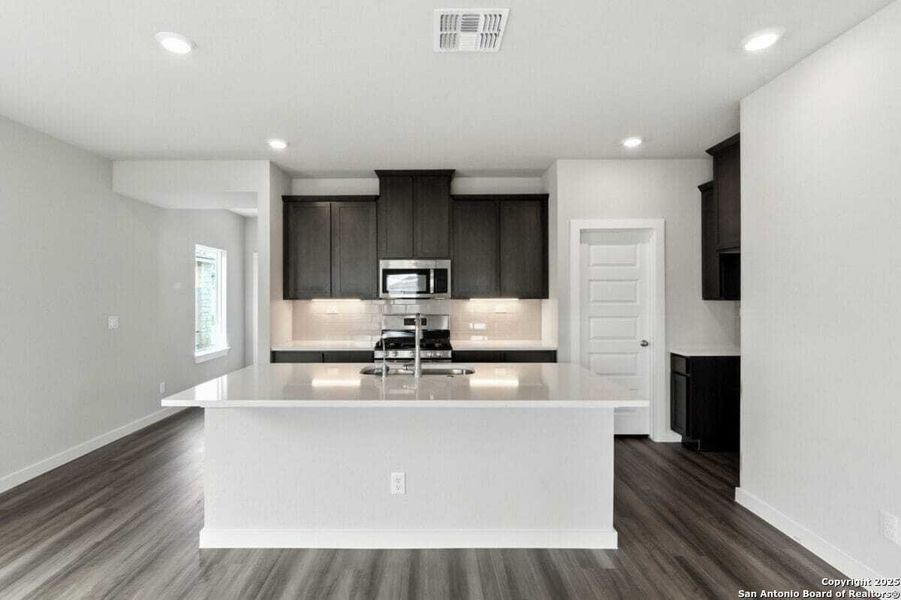 Furnished interior view inside a new home in August Fields, New Braunfels (Image 10).