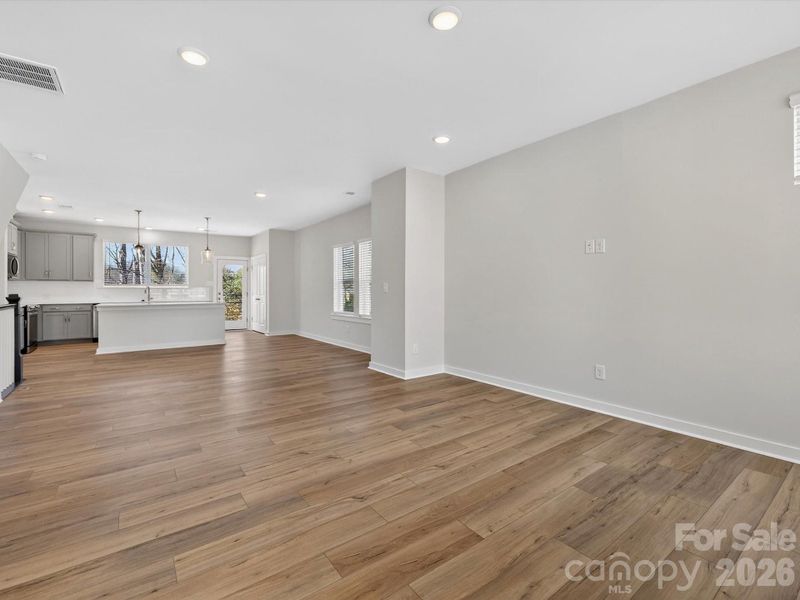 Spacious, unfurnished interior of a new home in Central Living at Craig, Charlotte (Image 13).