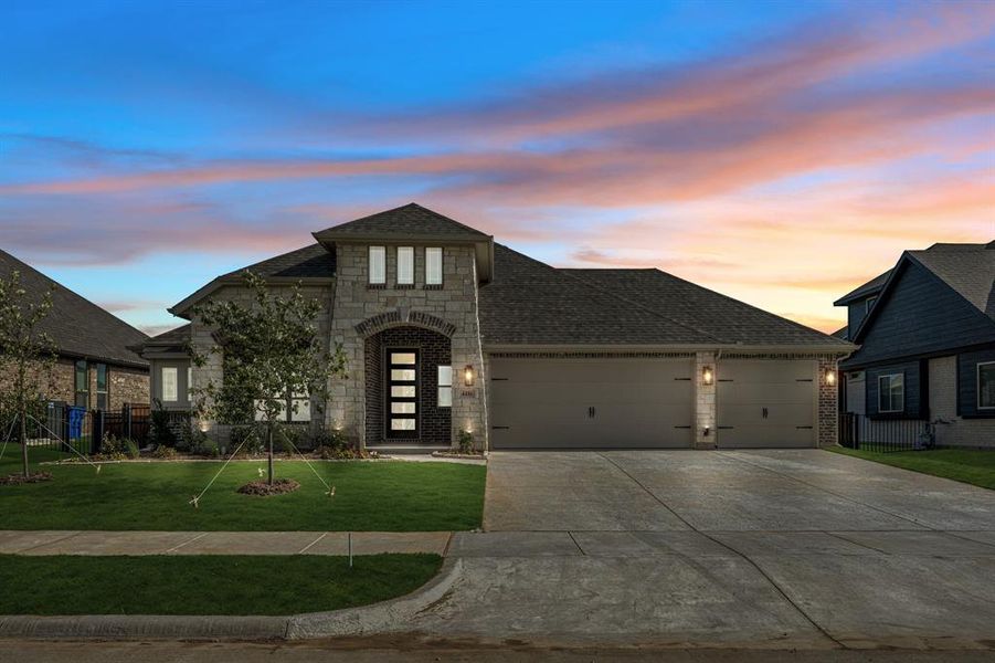 Front exterior of a new home in Silo Mills Classic 70, Joshua, TX, highlighting curb appeal (Image 1). Front exterior of a new home in Silo Mills Classic 70, Joshua, TX, highlighting curb appeal (Image 1).
