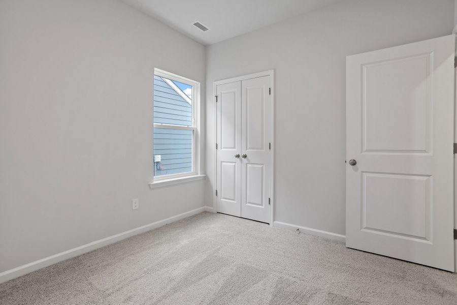 Spacious, unfurnished interior of a new home in Ovation at Sweetbrier, Durham (Image 27).