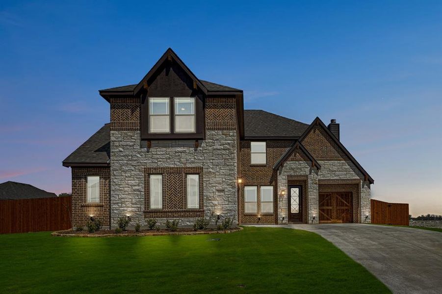 Front exterior of a new home in The Oasis at North Grove 75-80, Waxahachie, TX, highlighting curb appeal (Image 1). Front exterior of a new home in The Oasis at North Grove 75-80, Waxahachie, TX, highlighting curb appeal (Image 1).