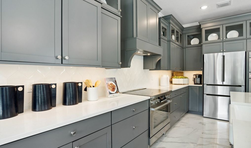 Kitchen with gorgeous tile backsplash