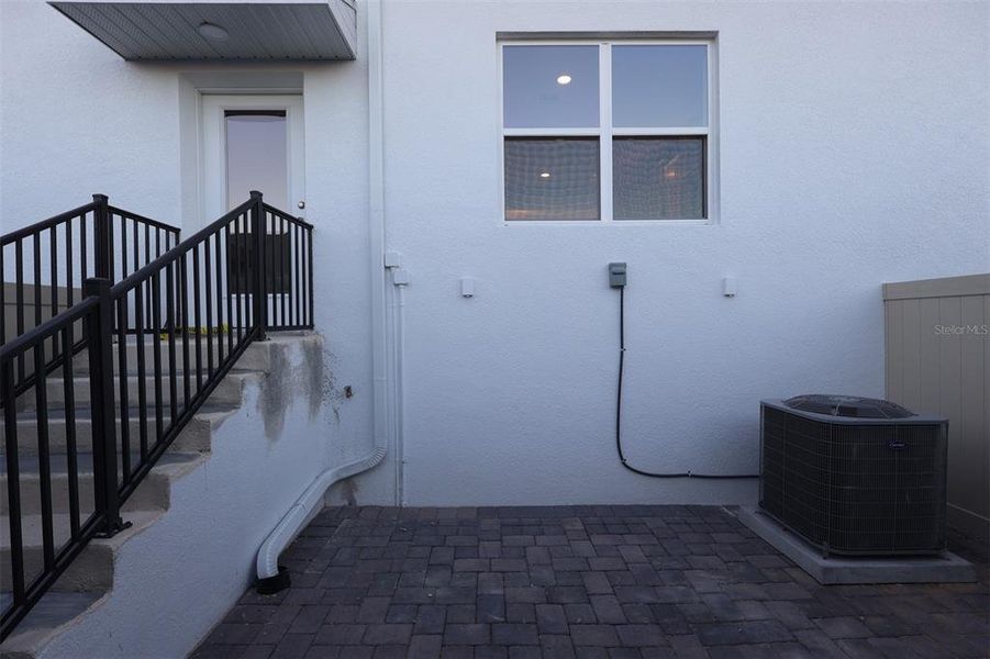 Exterior details and patio area of a home in Tribute at Ovation, Winter Garden (Image 28). Exterior details and patio area of a home in Tribute at Ovation, Winter Garden (Image 28).