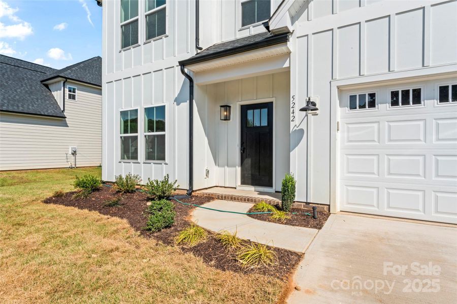 Front exterior of a new home in , Harrisburg, NC, highlighting curb appeal (Image 2).