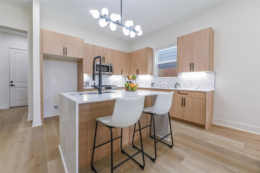 Island open to family room & dining is great for entertaining. Island open to family room & dining is great for entertaining.