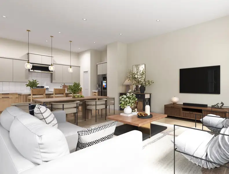 Modern open-concept layout seamlessly connects the living, dining, and kitchen areas. Perfect for entertaining with stylish finishes and ample natural light.