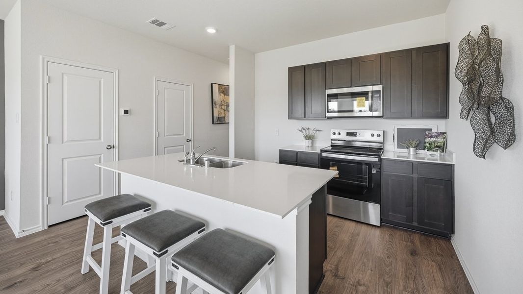 Representative furnished interior of a home built from the Argentina by D.R. Horton in Arbor Trails South, Princeton (Image 5).