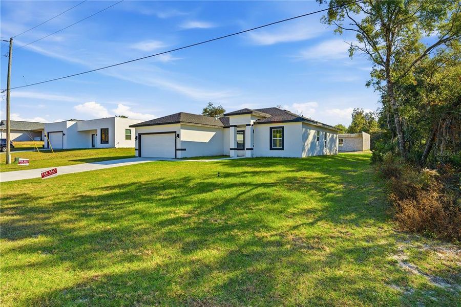Exterior details and patio area of a home in , Ocala (Image 23).
