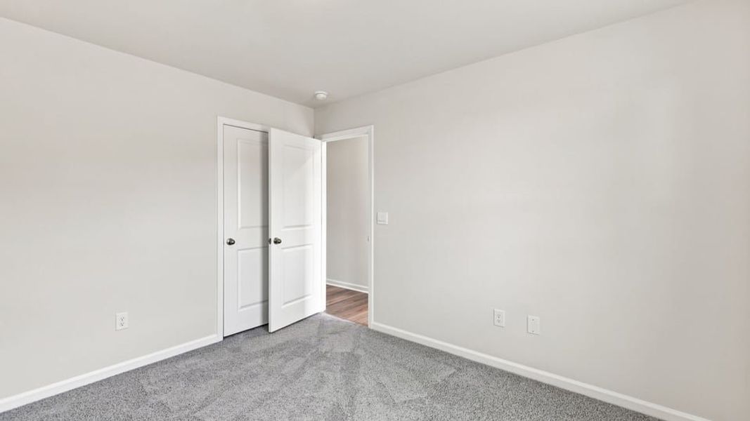Spacious, unfurnished interior of a new home in Village 3, Woodruff (Image 28).