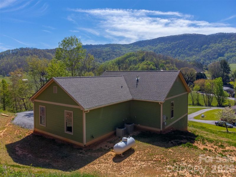 Exterior details and patio area of a home in , Waynesville (Image 30).