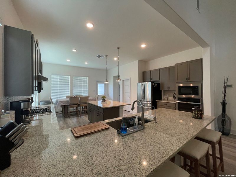Furnished interior view inside a new home in Hunters Ranch, San Antonio (Image 3).