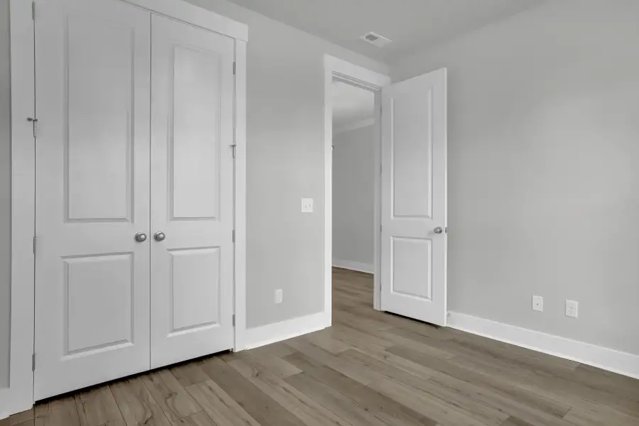 Spacious, unfurnished interior of a new home in Grand Park, Leland (Image 14). Spacious, unfurnished interior of a new home in Grand Park, Leland (Image 14).