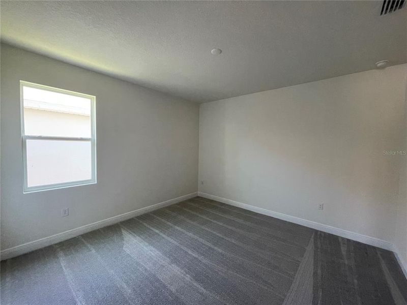 Spacious, unfurnished interior of a new home in Angeline, Land O' Lakes (Image 19).