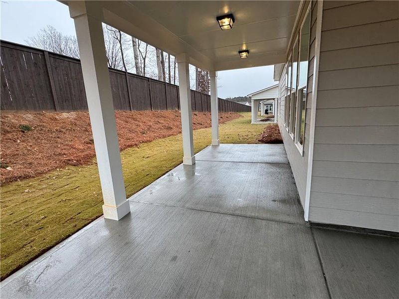 Exterior details and patio area of a home in Rosewood Lake Preserve, Hoschton (Image 3).