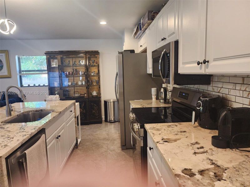 Furnished interior view inside a new home in , Delray Beach (Image 13). Furnished interior view inside a new home in , Delray Beach (Image 13).