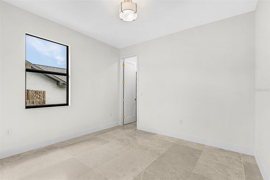 Spacious, unfurnished interior of a new home in , Port Charlotte (Image 14).