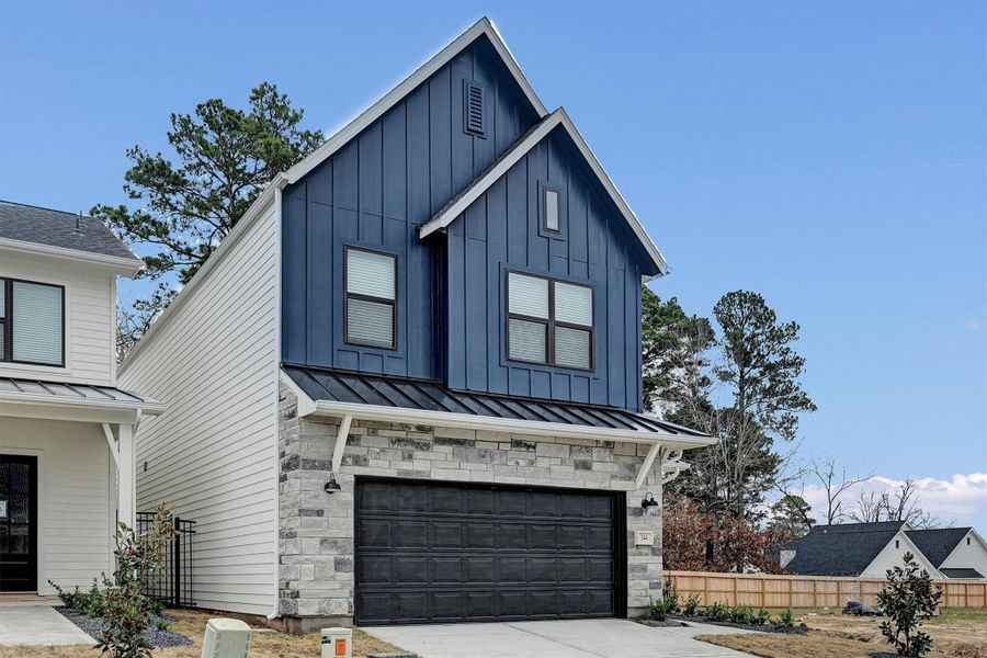 Front exterior of a new home in Summer Place  35', Montgomery, TX, highlighting curb appeal (Image 26).