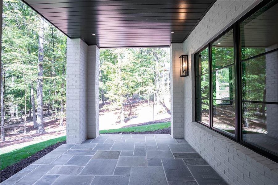 Exterior details and patio area of a home in , Greensboro (Image 31).