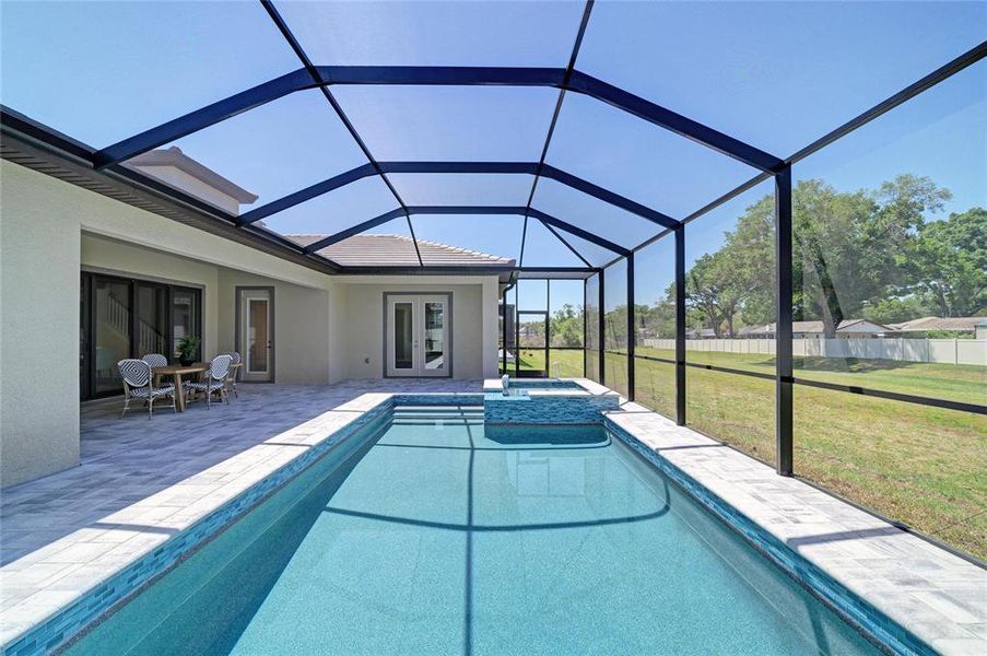 Exterior details and patio area of a home in Hidden Lakes, Brandon (Image 28).