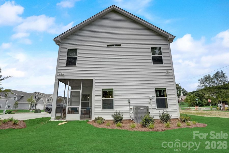 Exterior details and patio area of a home in Country Club Village, Salisbury (Image 4).