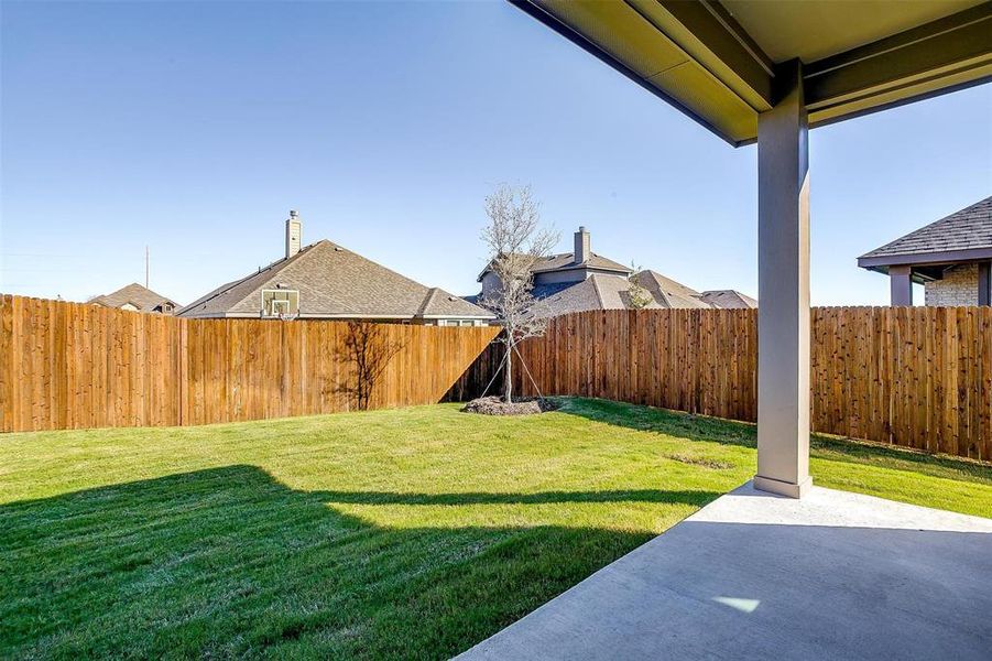 View of yard with a patio area