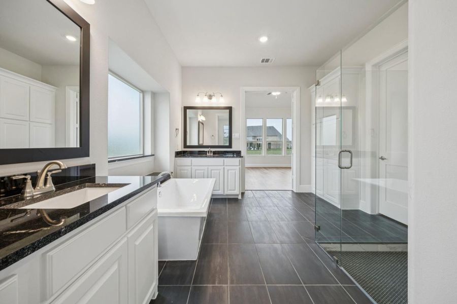 Representative furnished interior of a home built from the Grand Maison III by Grand Homes in Kings Crossing, Parker (Image 9).