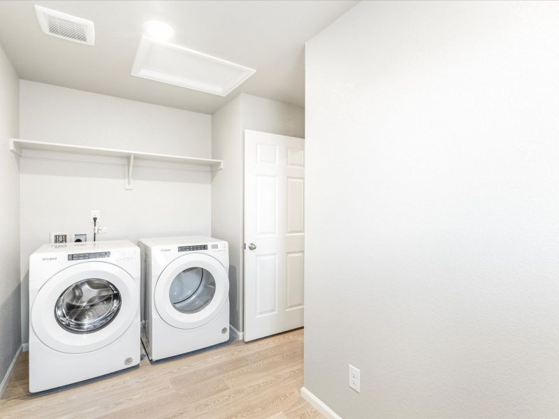 Laundry in the Wateron floorplan at a Meritage Homes community in Brighton, CO.