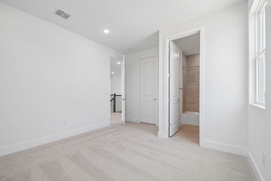 Spacious, unfurnished interior of a new home in Freedom at Anthem, Kyle (Image 24).