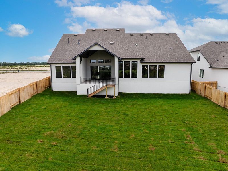 Exterior details and patio area of a home in Lariat - 80', Liberty Hill (Image 1). Exterior details and patio area of a home in Lariat - 80', Liberty Hill (Image 1).