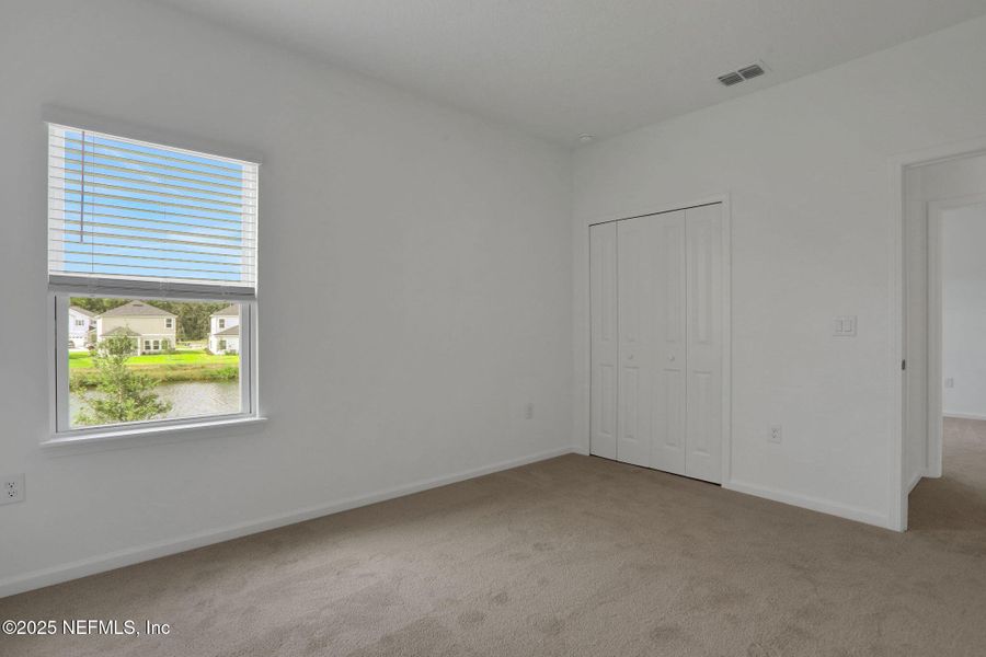 Spacious, unfurnished interior of a new home in TrailMark, St. Augustine (Image 29).