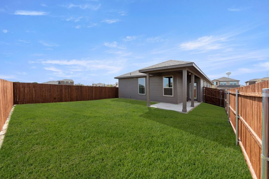 Front exterior of a new home in Creekside Ranch, Blue Ridge, TX, highlighting curb appeal (Image 26).