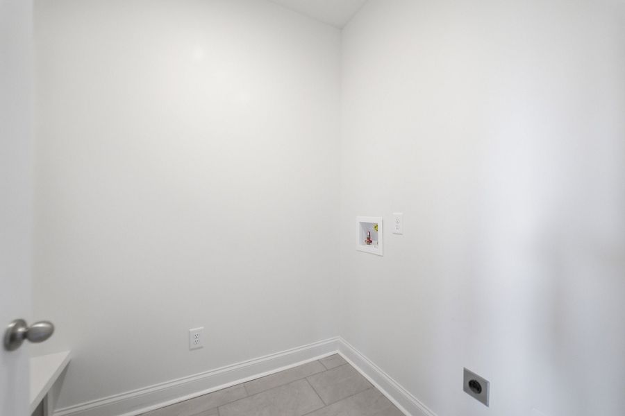 Spacious, unfurnished interior of a new home in Dorris Farm, White House (Image 37).