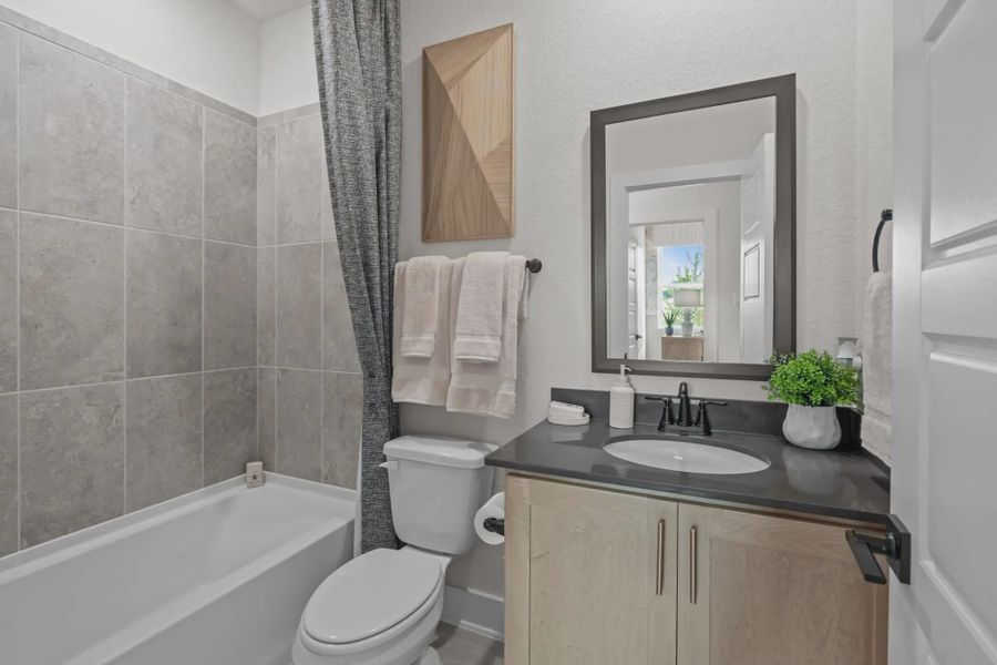 Representative furnished interior of a home built from the Apollo by Chesmar Homes in Santa Rita Ranch, Liberty Hill (Image 4).