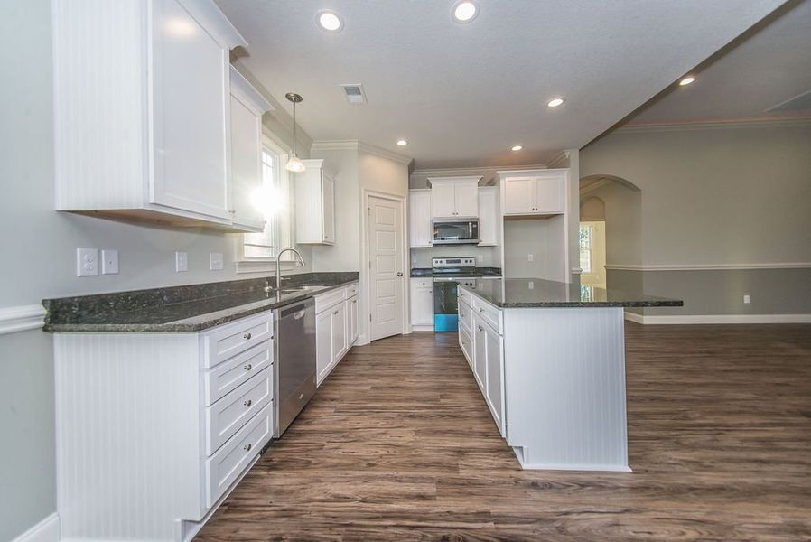 Representative furnished interior of a home built from the Mediterranean by Enchanted Homes in Lonesome Dove, San Antonio (Image 8).