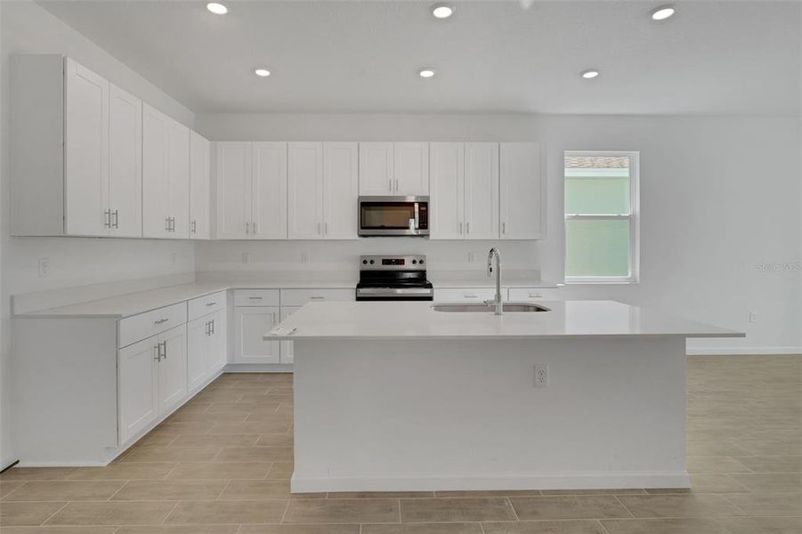Furnished interior view inside a new home in Willowbrook North, Winter Haven (Image 8).