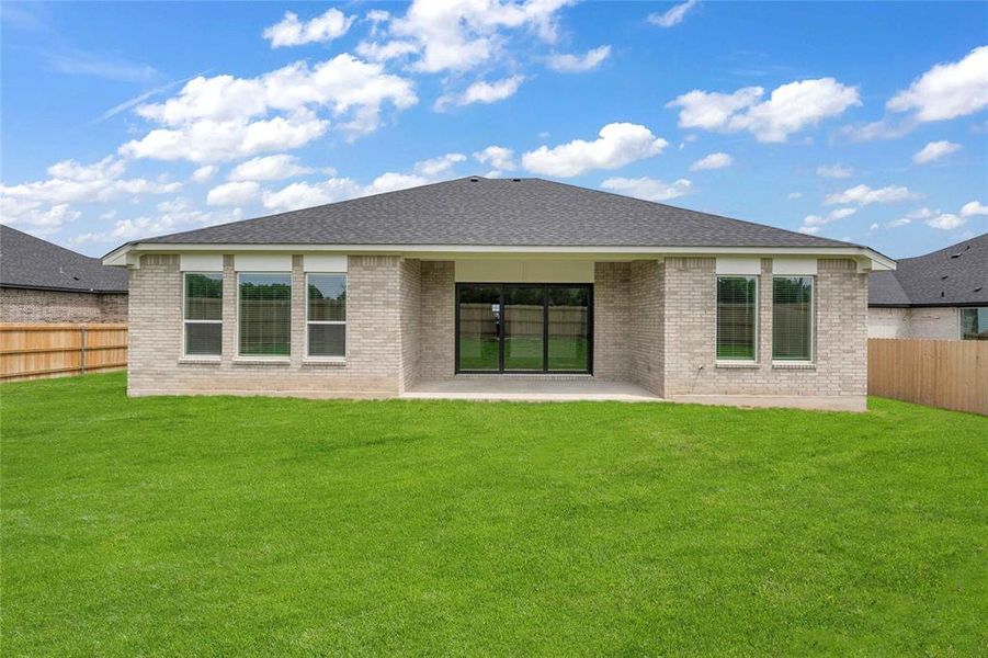 Please Note: These exterior photos are not of the actual home but are of a completed one with a similar floor plan. Finishes, features, and layouts may vary.