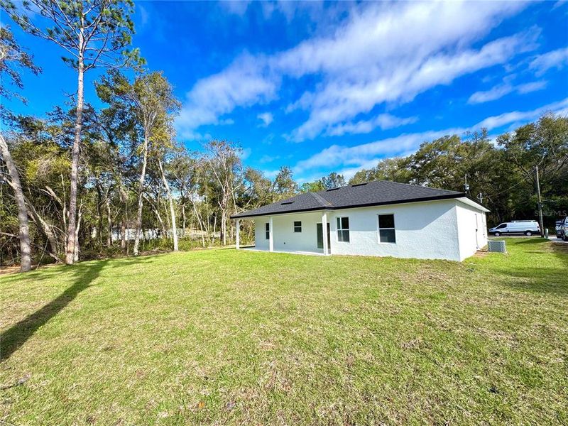 Exterior details and patio area of a home in , Citrus Springs (Image 17).