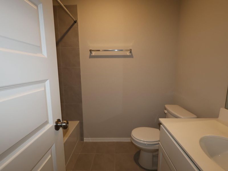 Furnished interior view inside a new home in Heritage, Dripping Springs (Image 4).