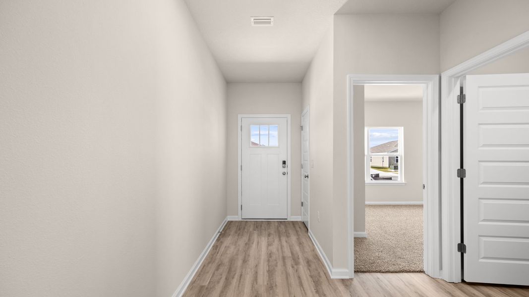 Spacious, unfurnished interior of a new home in Hodges Bayou Plantation, Panama City (Image 16).