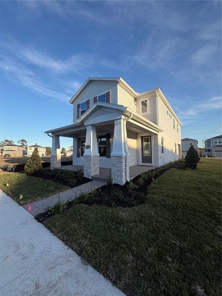 Exterior details and patio area of a home in Center Lake on the Park, St. Cloud (Image 3).