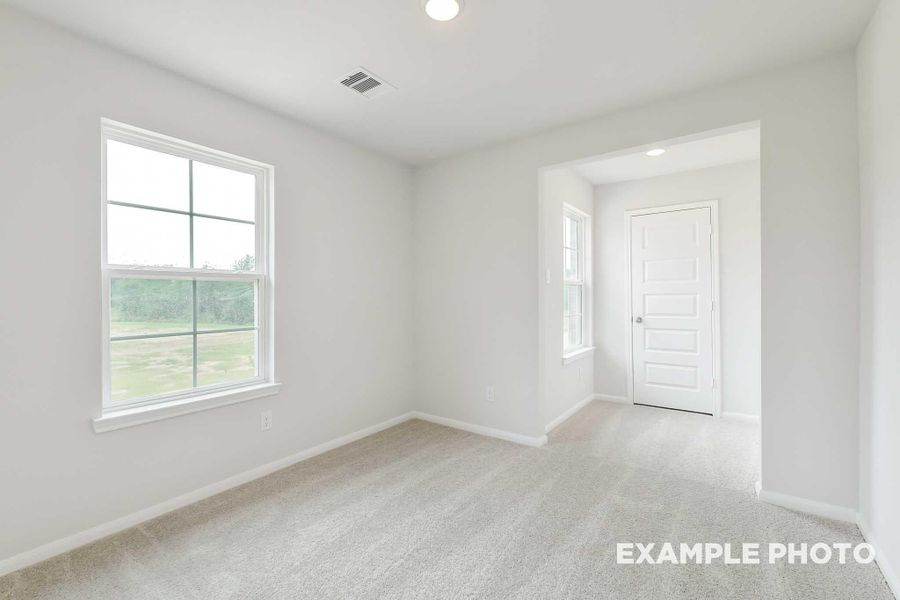 Spacious, unfurnished interior of a new home in Caney Creek Place, Conroe (Image 31).