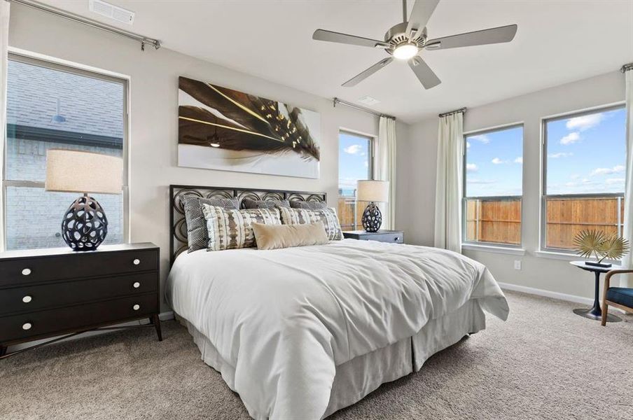 Primary bedroom in the Wimbledon home plan by Trophy Signature Homes – REPRESENTATIVE PHOTO Primary bedroom in the Wimbledon home plan by Trophy Signature Homes – REPRESENTATIVE PHOTO