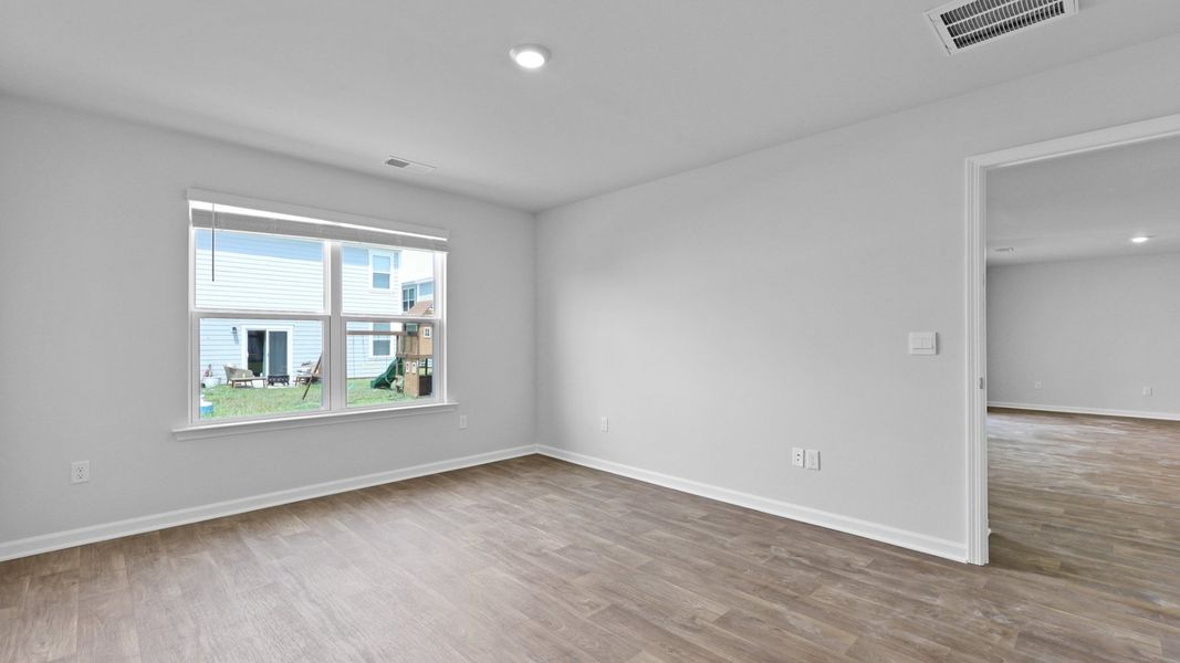 Representative unfurnished interior of a home built from the Cali by D.R. Horton in Center Pointe, Santee (Image 16).
