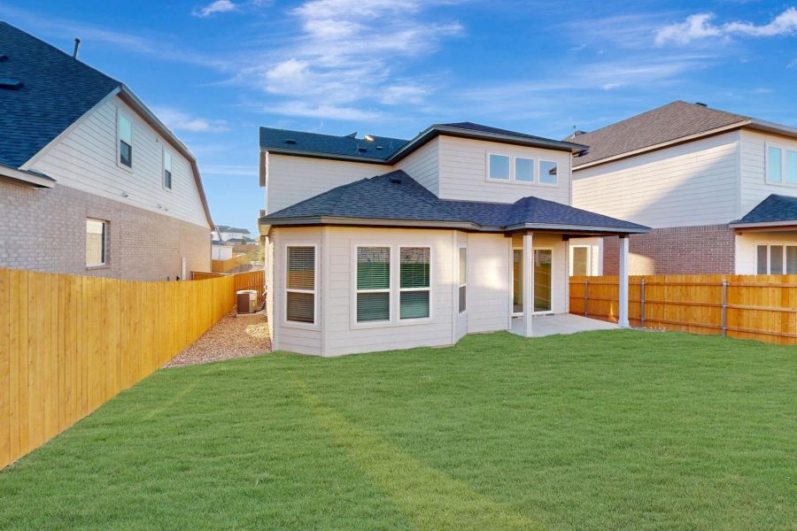 Exterior details and patio area of a home in Cedar Brook, Leander (Image 16).